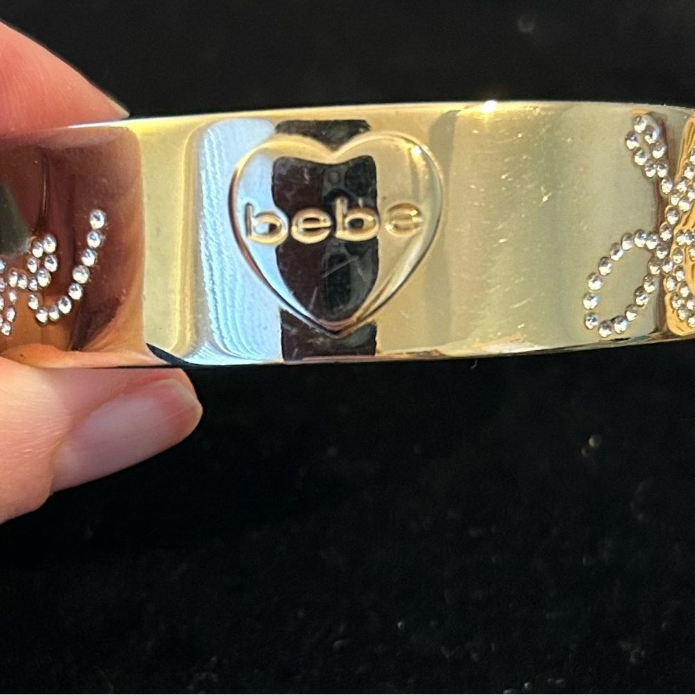 Bebe Chunky Gold Tone and Rhinestone Love Bangle